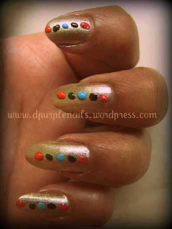 Golden  nails with multi dots