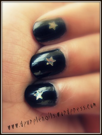 Black shiny star nails
